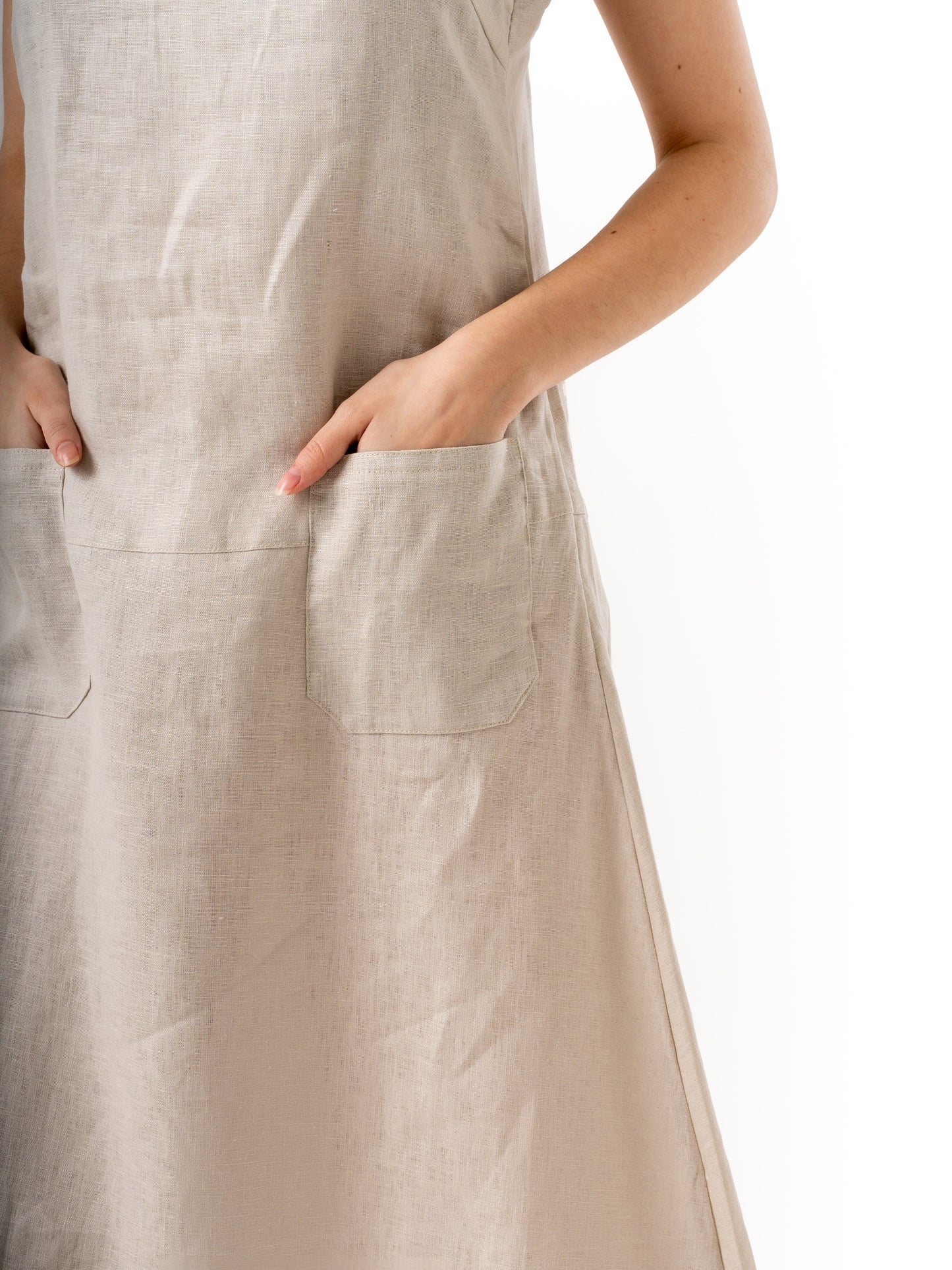 Woman wearing high quality linen long dress in beige