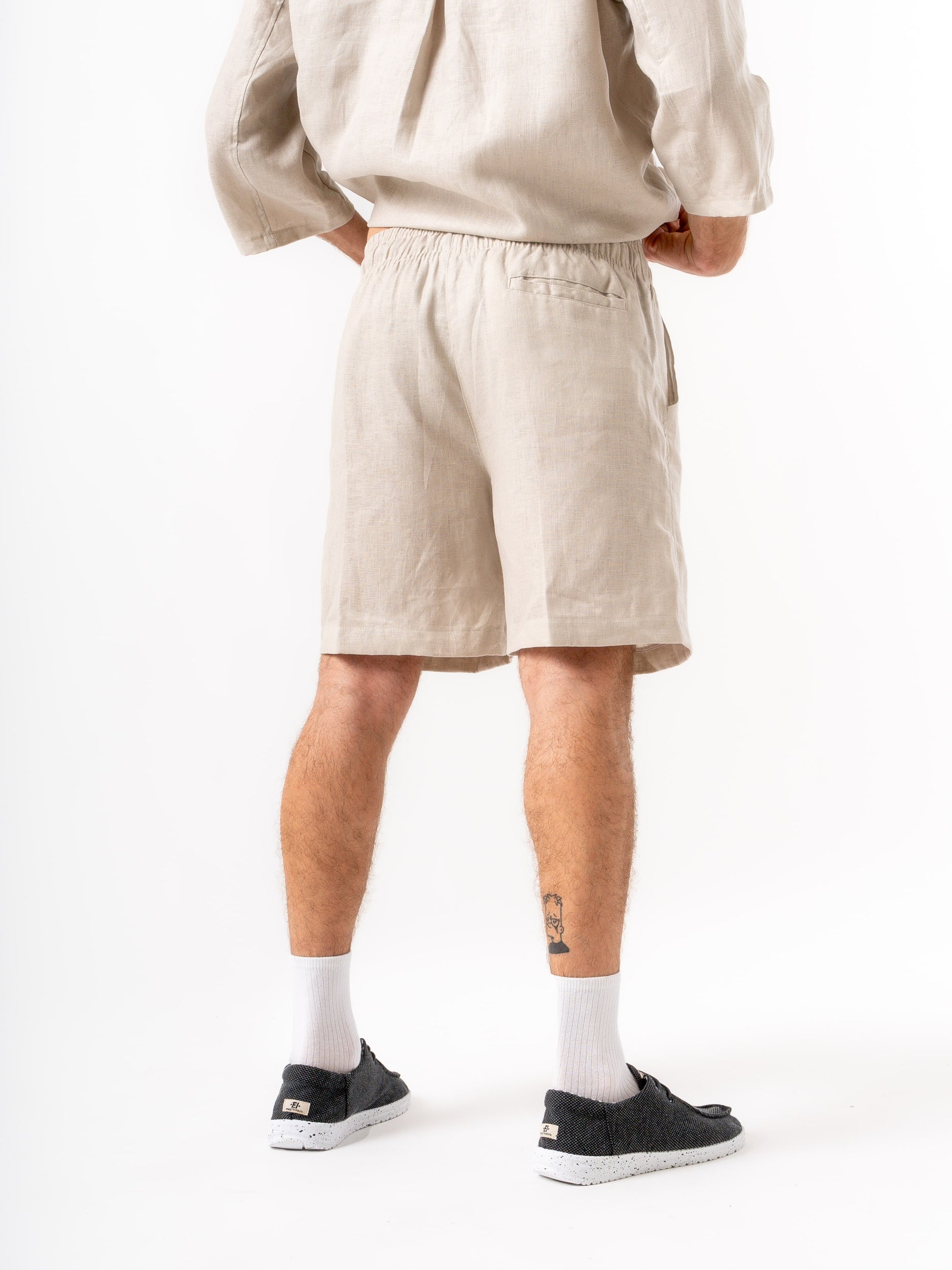 Man wearing high quality linen shorts and shirt