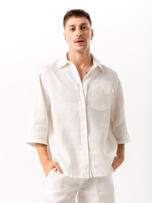 Man wearing high quality linen shorts and shirt in white