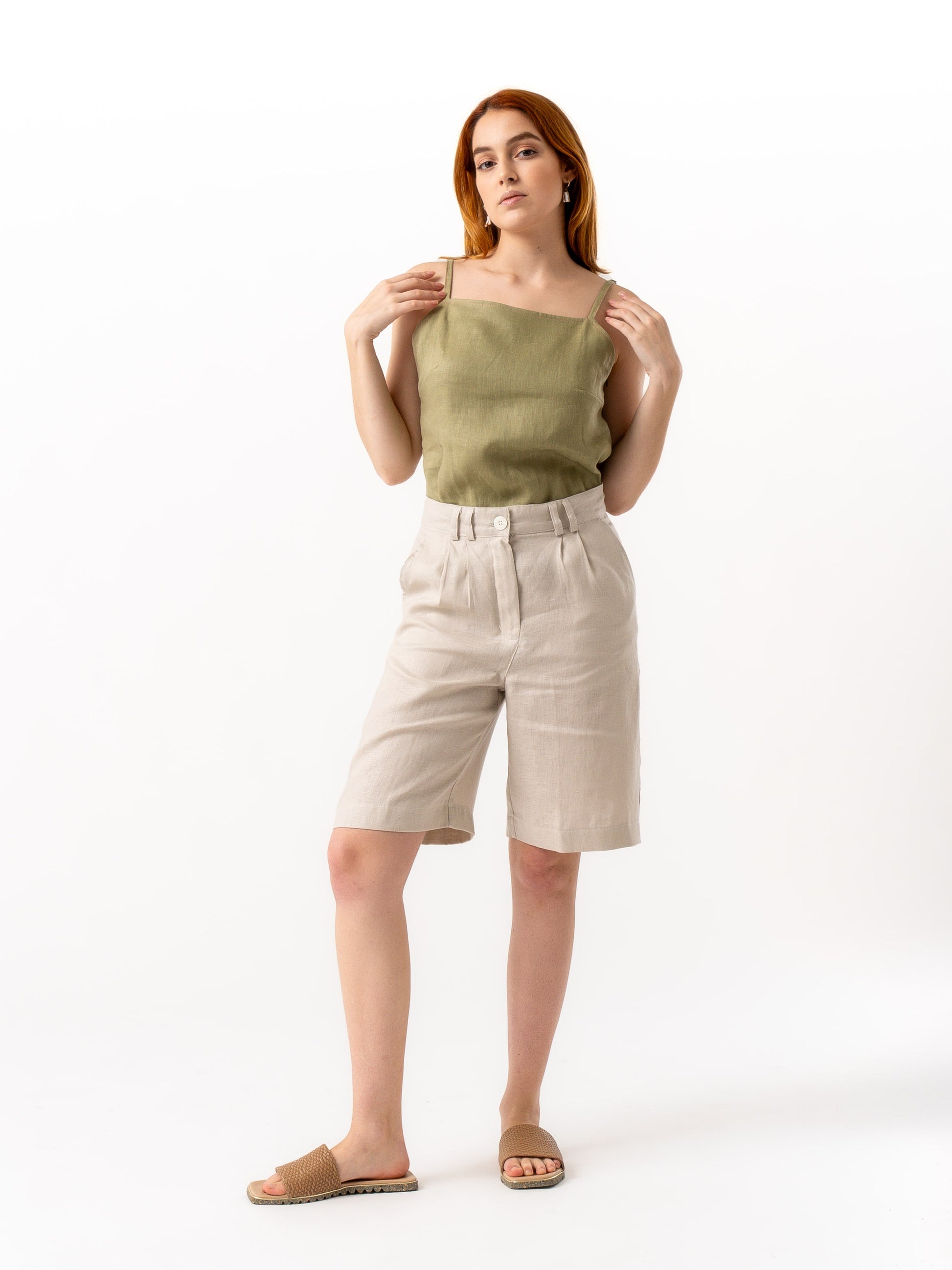 woman wearing tailored shorts beige