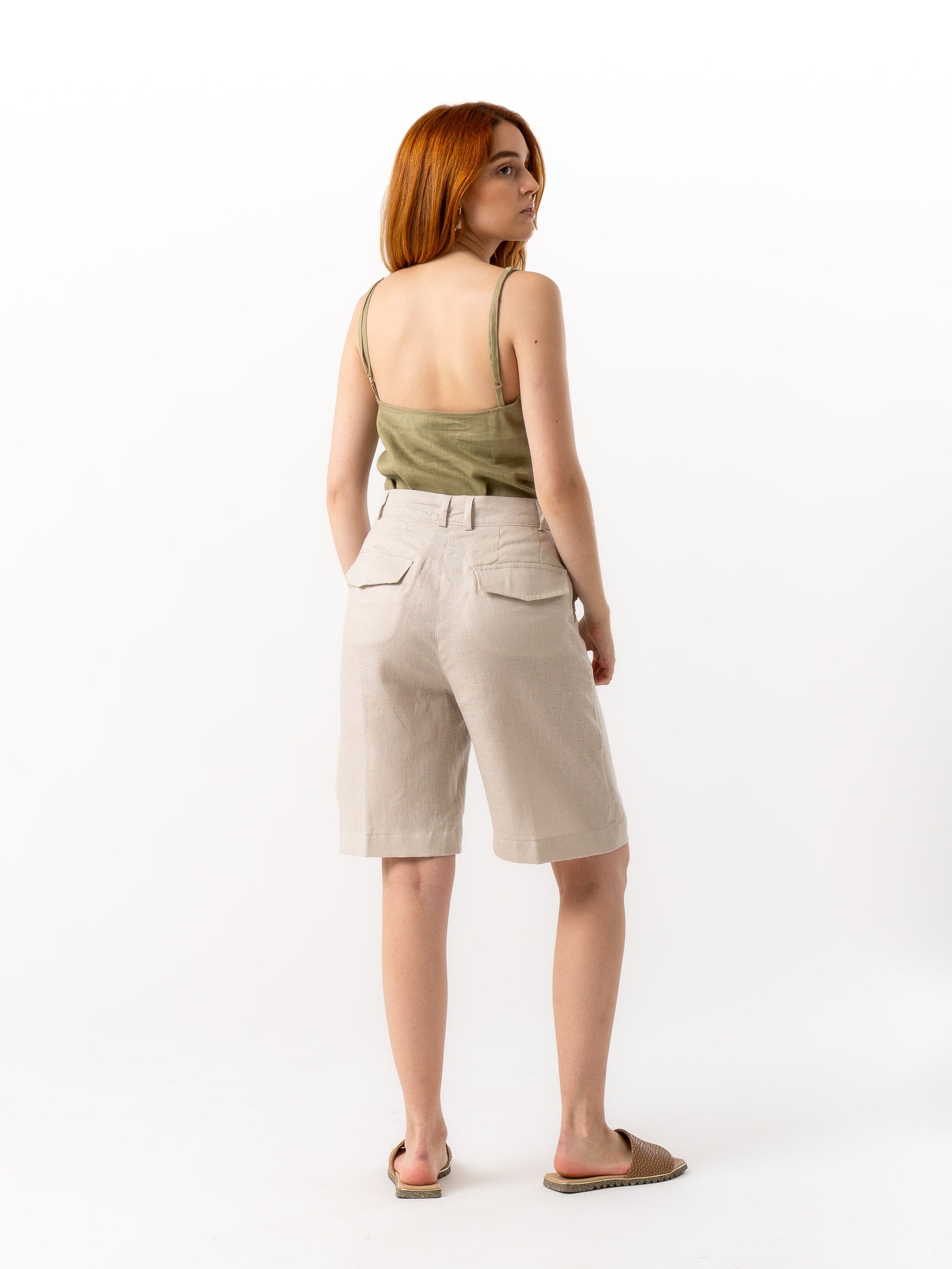 woman wearing tailored shorts beige