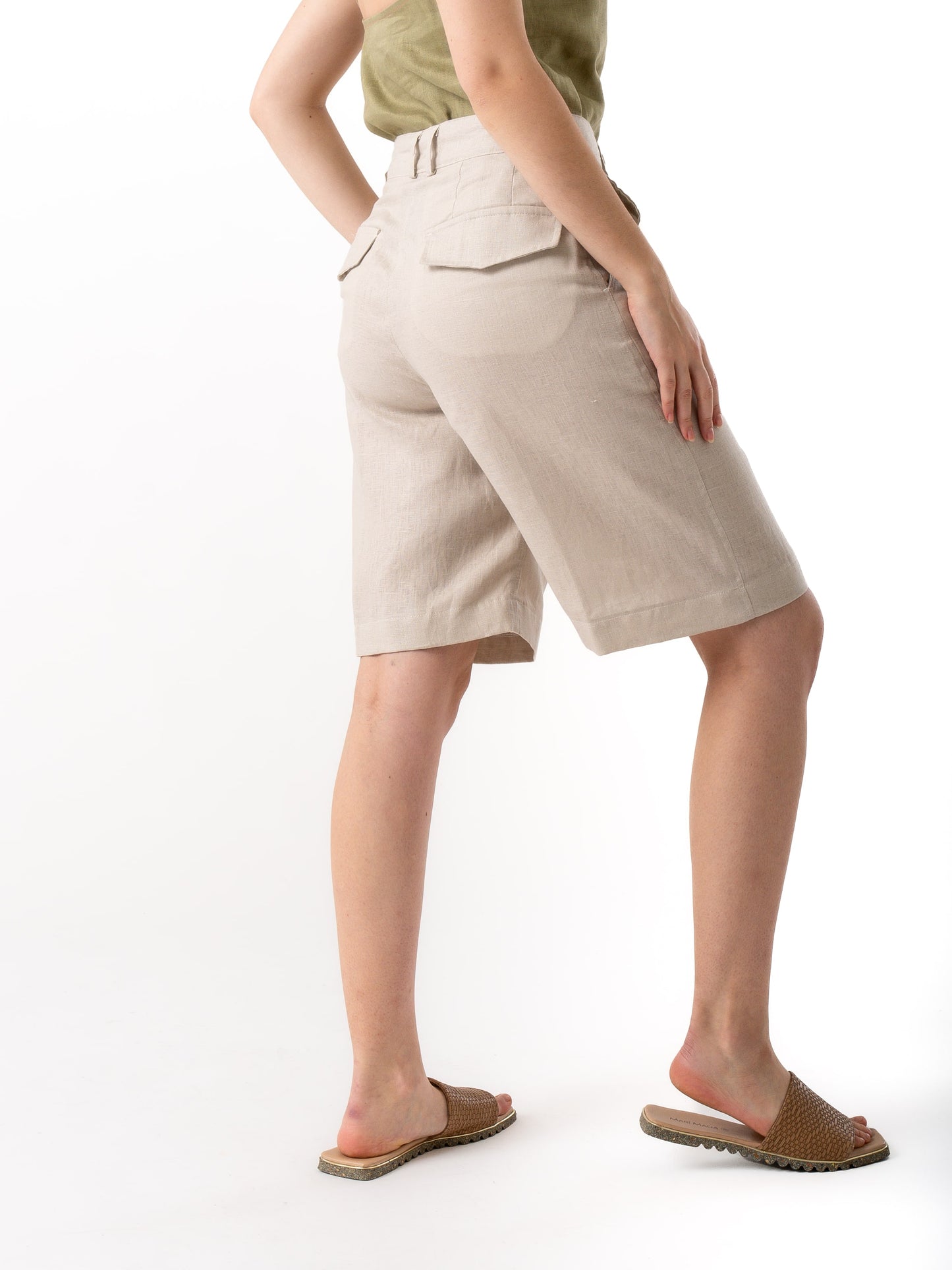 woman wearing tailored shorts beige