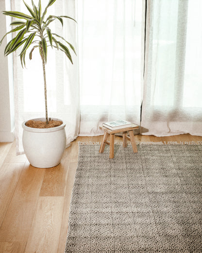 especie humana block print rugs